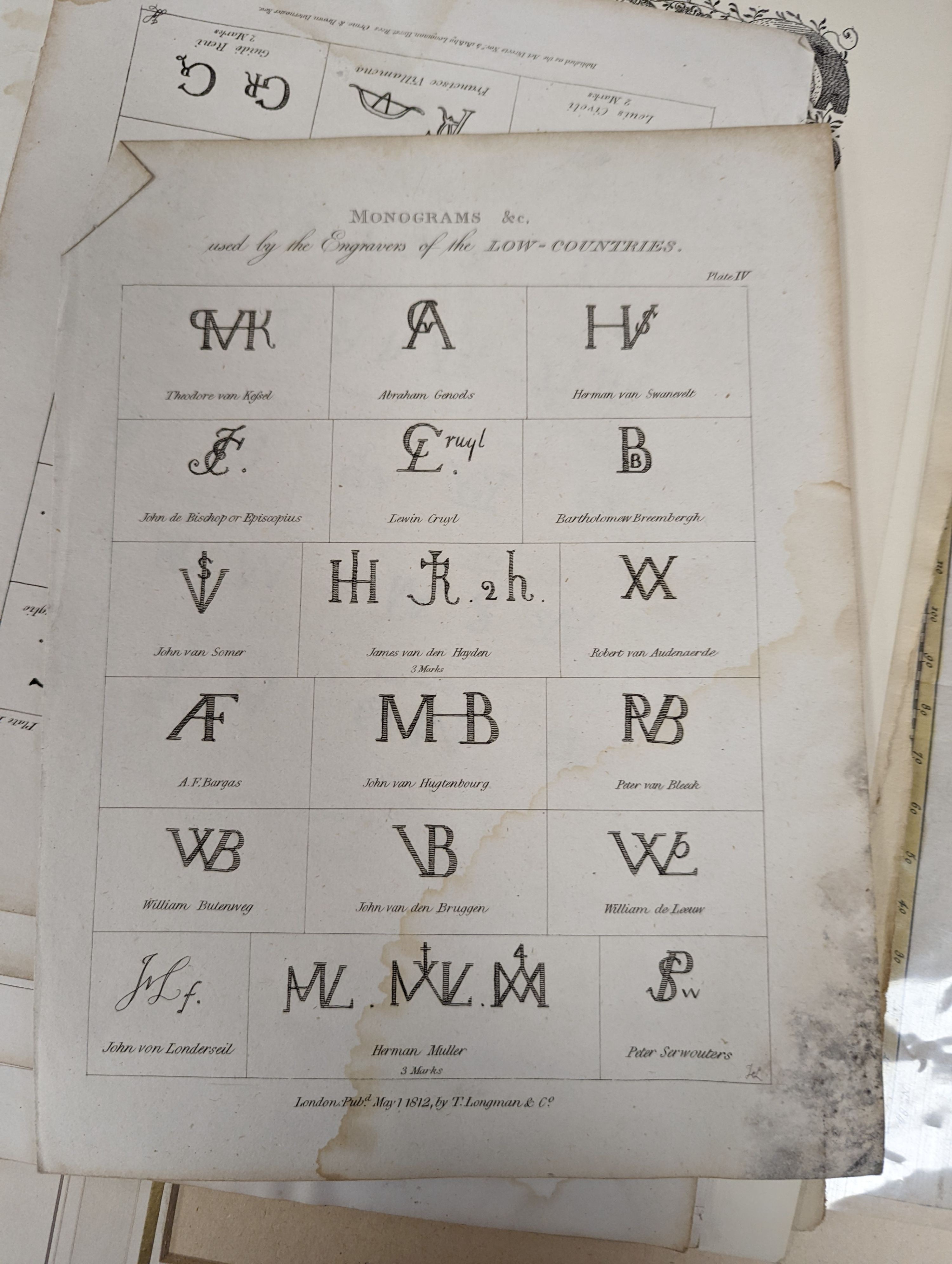 A folio of 18th/19th century maps and scientific engravings, including an engraving after Ludovico Lanberti, a map of the World plotting Bourgainvilles voyage of 1772